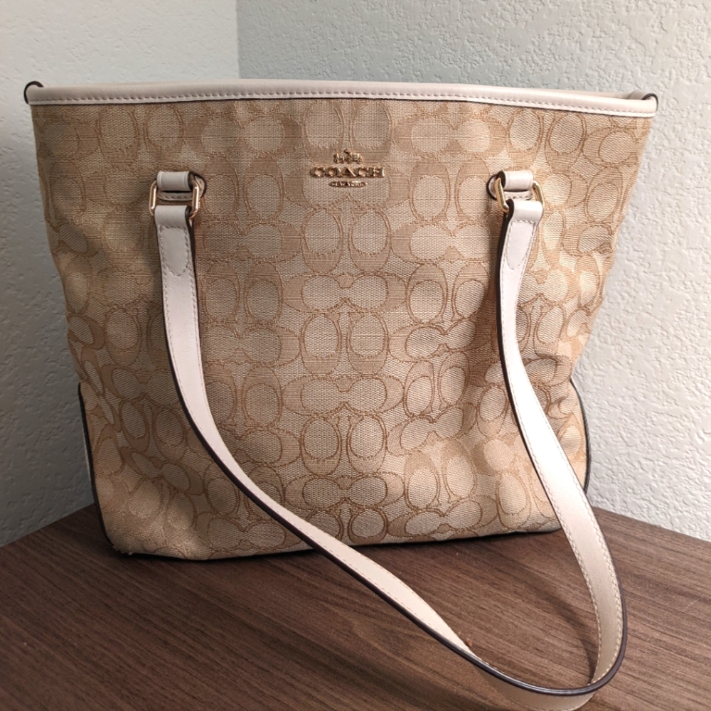 Coach pattern tan purse
